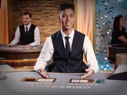 Live Jakarta Lottery draw studio with professional dealer and number-selection display